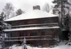 Closeup of Chimney Cabin in Winter